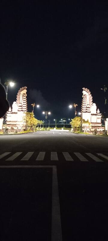 Illuminated Balinese Gate Street Lamp Night Road Crosswalk