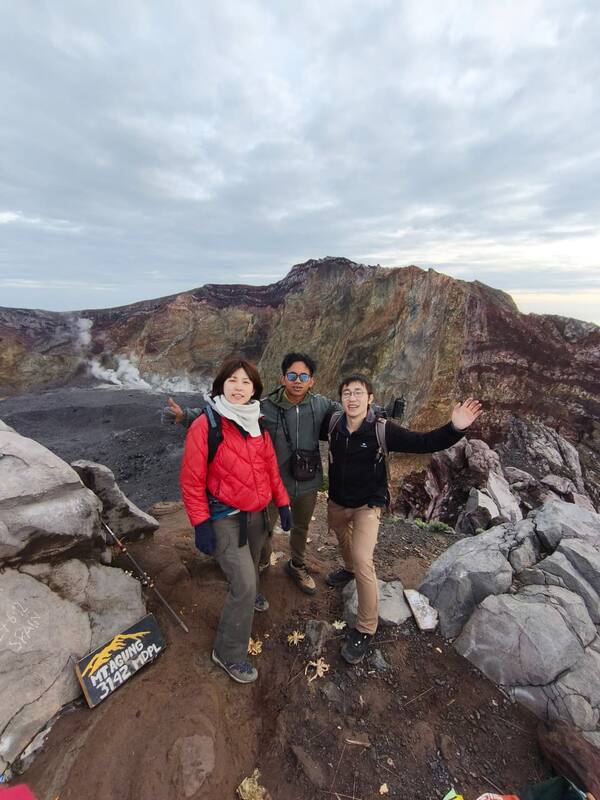 Three Hikers On Volcanic Mountain Itagunq 3142 Meters