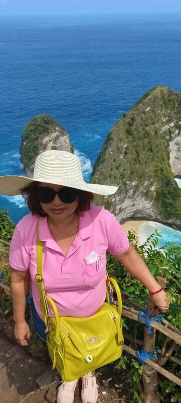 Woman In Pink Shirt White Hat Yellow Bag Ocean View Cliff