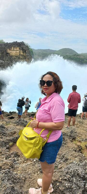 Woman In Pink Shirt With Yellow Handbag Near Ocean Waves