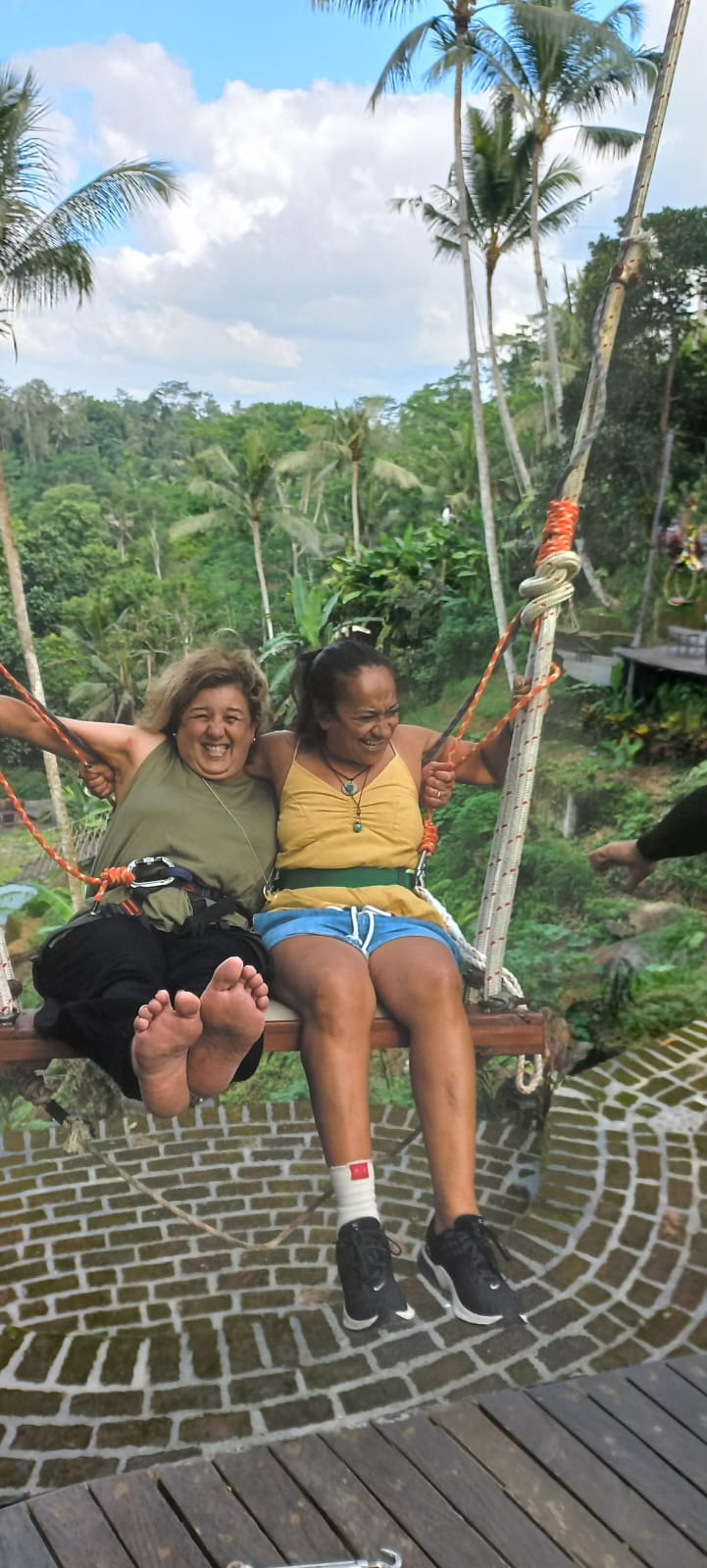 Women on a jungle swing